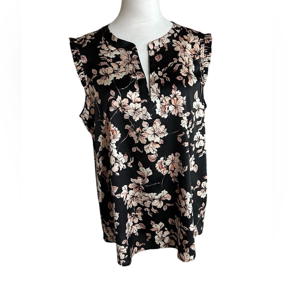 A pretty Karl Lagerfeld sleeveless blouse with a floral design on black
